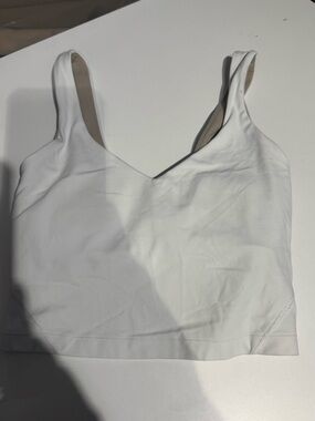 both Lululemon, my daughter took tags off I believe they are a size 0